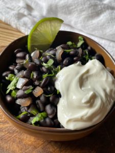 Guatemalan Black Beans with vegan sour cream