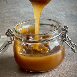 Butterscotch sauce in a jar.