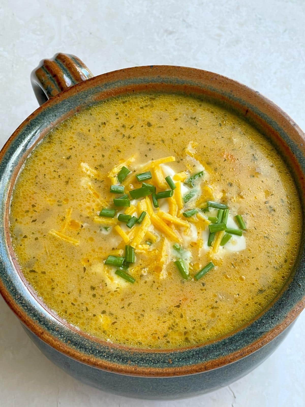 Potato soup with toppings.