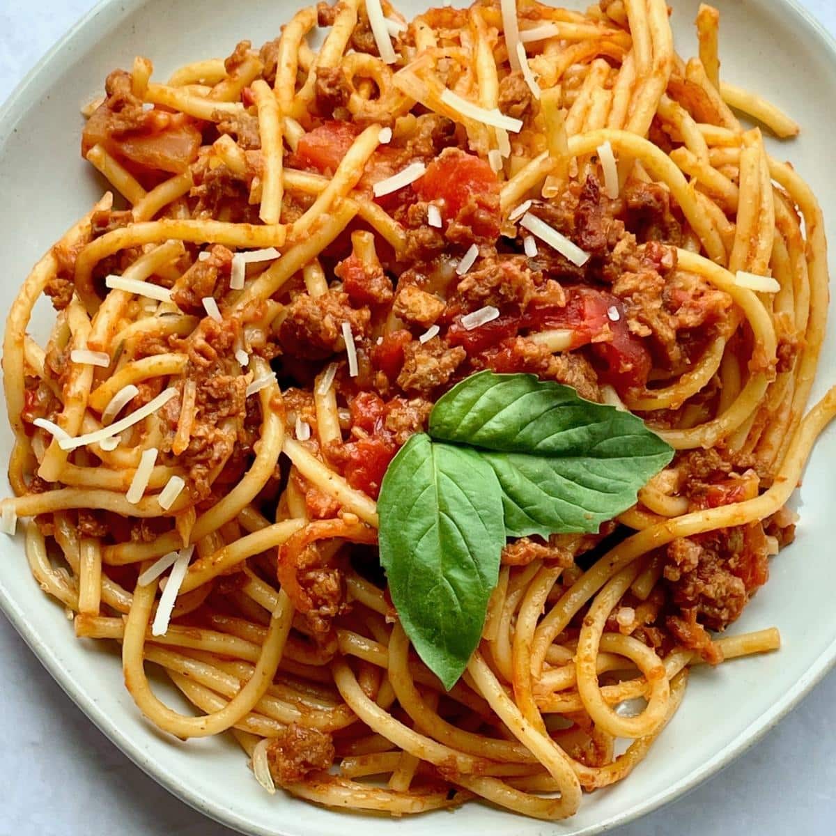 Plate with vegan baked spaghetti.
