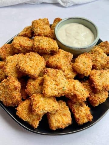 Angled view of breaded nuggets.