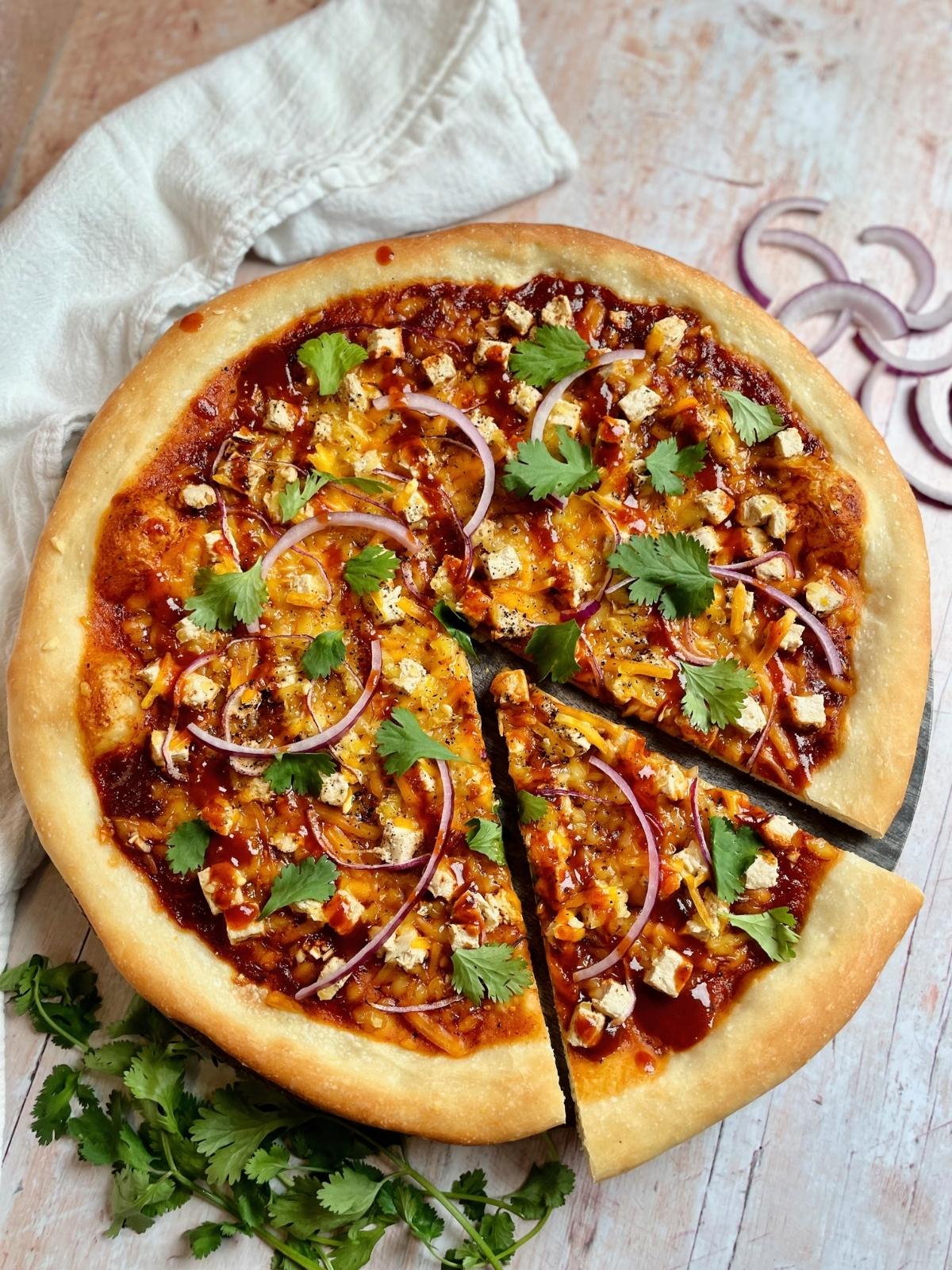 A slice of bbq pizza.
