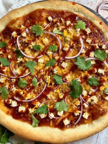 Up close view of bbq chicken pizza.