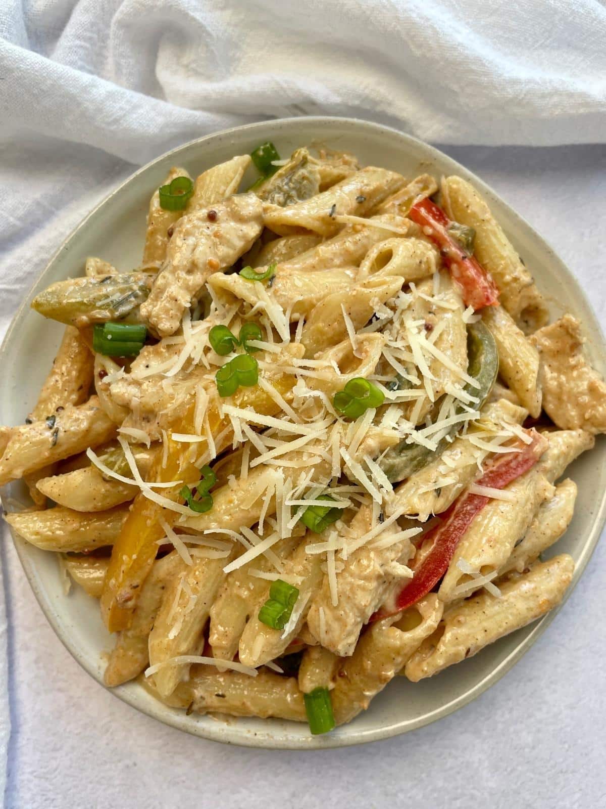 Rasta pasta with vegan parmesan.
