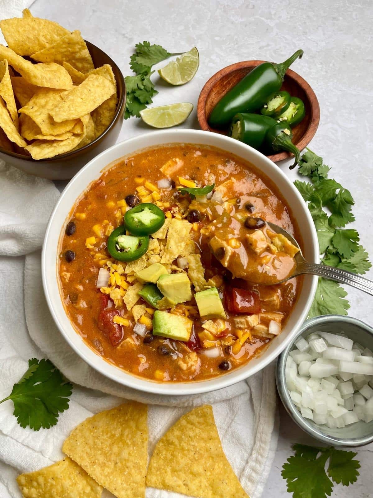 Enchilada soup with toppings.