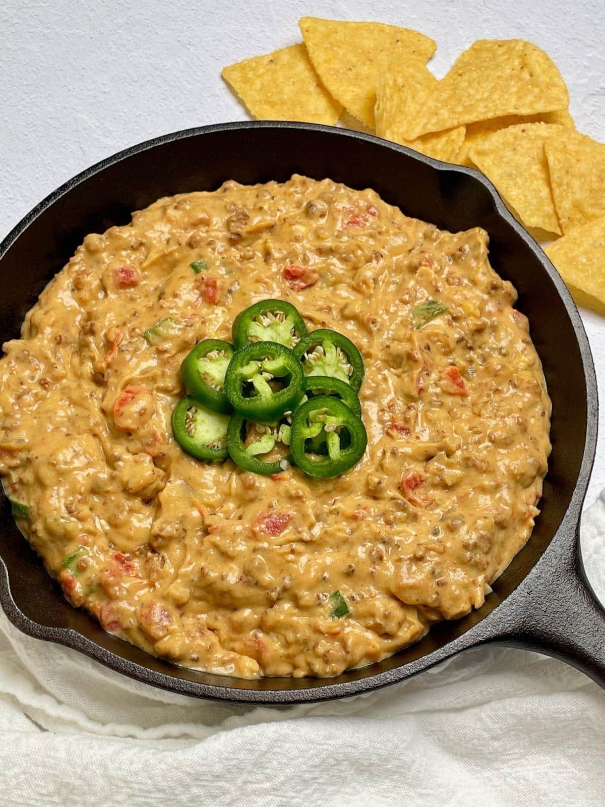 Rotel dip topped with jalapenos.