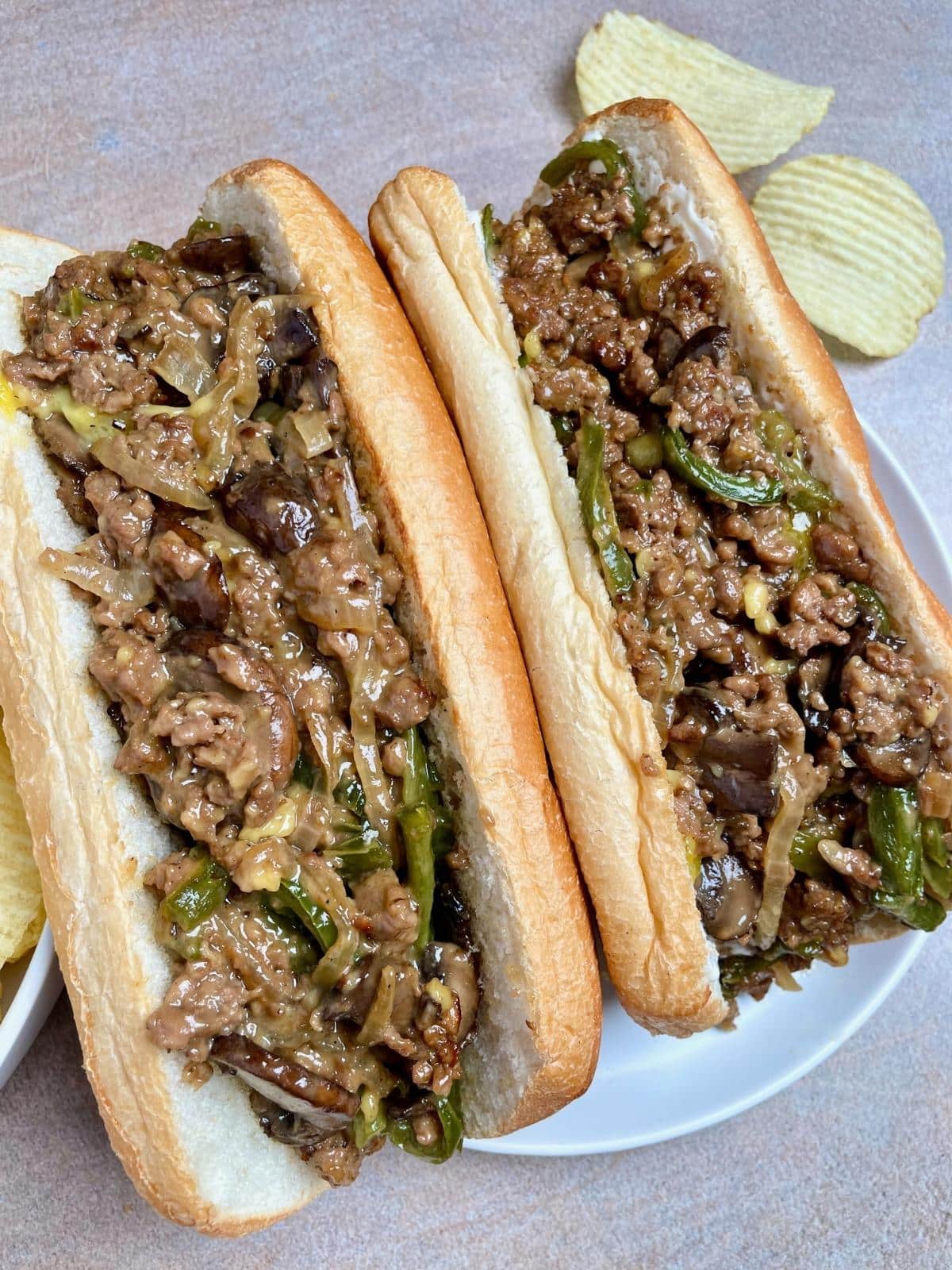 Two philly cheesesteaks.