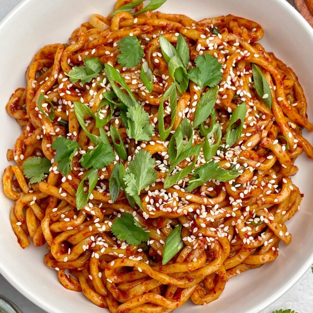 Close up view of garlic chili oil noodles.
