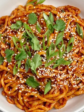 Close up view of garlic chili oil noodles.