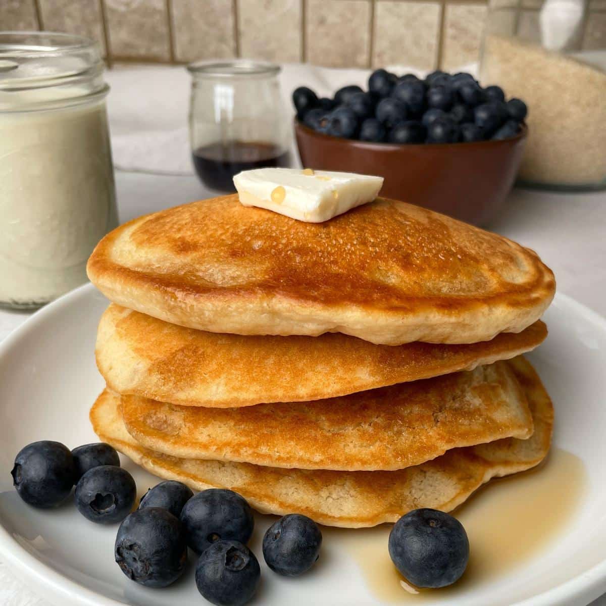 A stack of vegan oat milk pancakes.