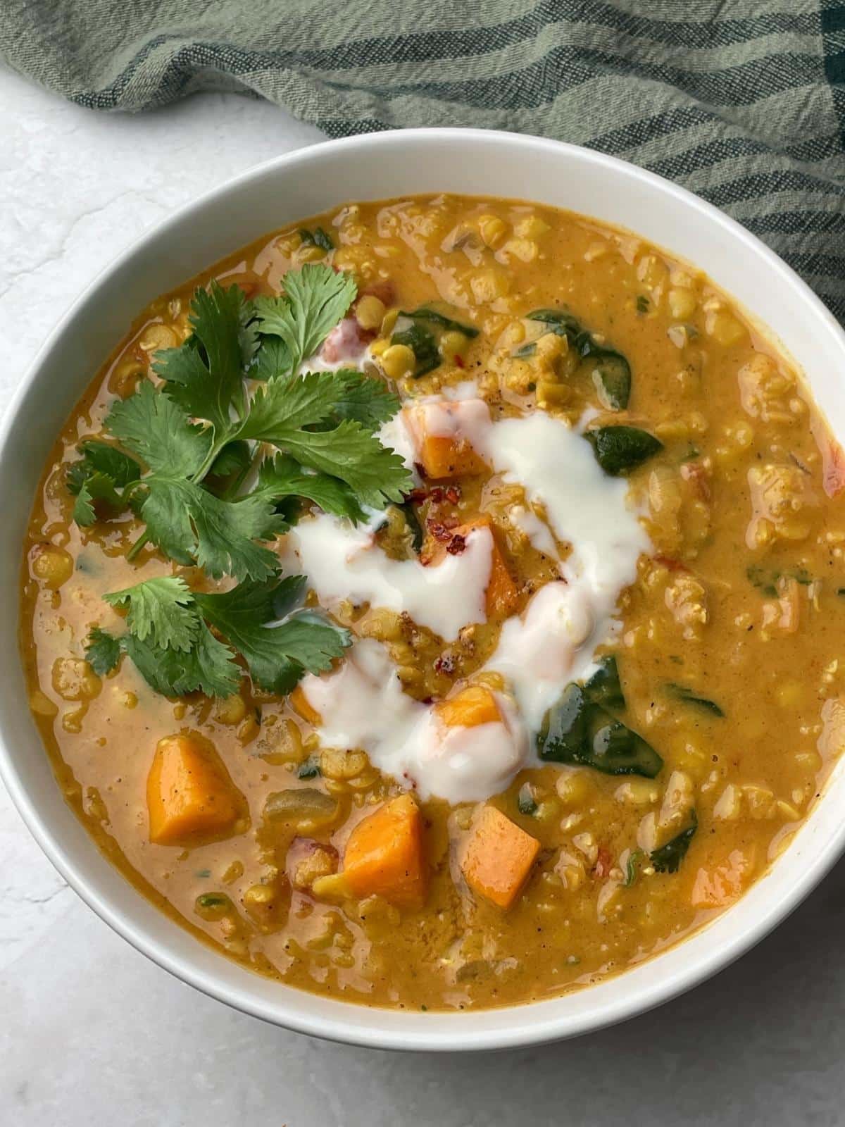 Red curry lentils with sweet potatoes and spinach.