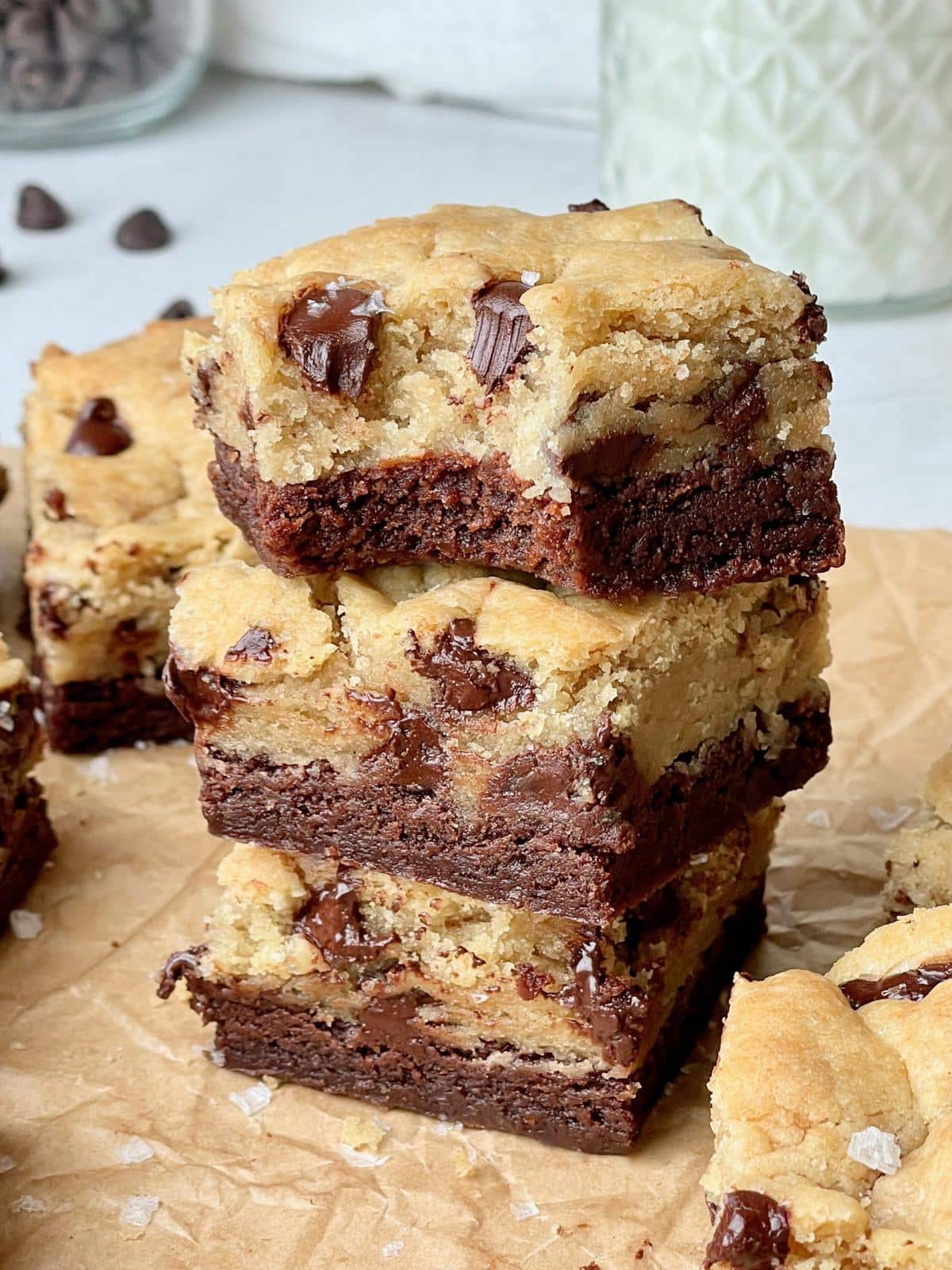 Stacked vegan brookies with chocolate chips.