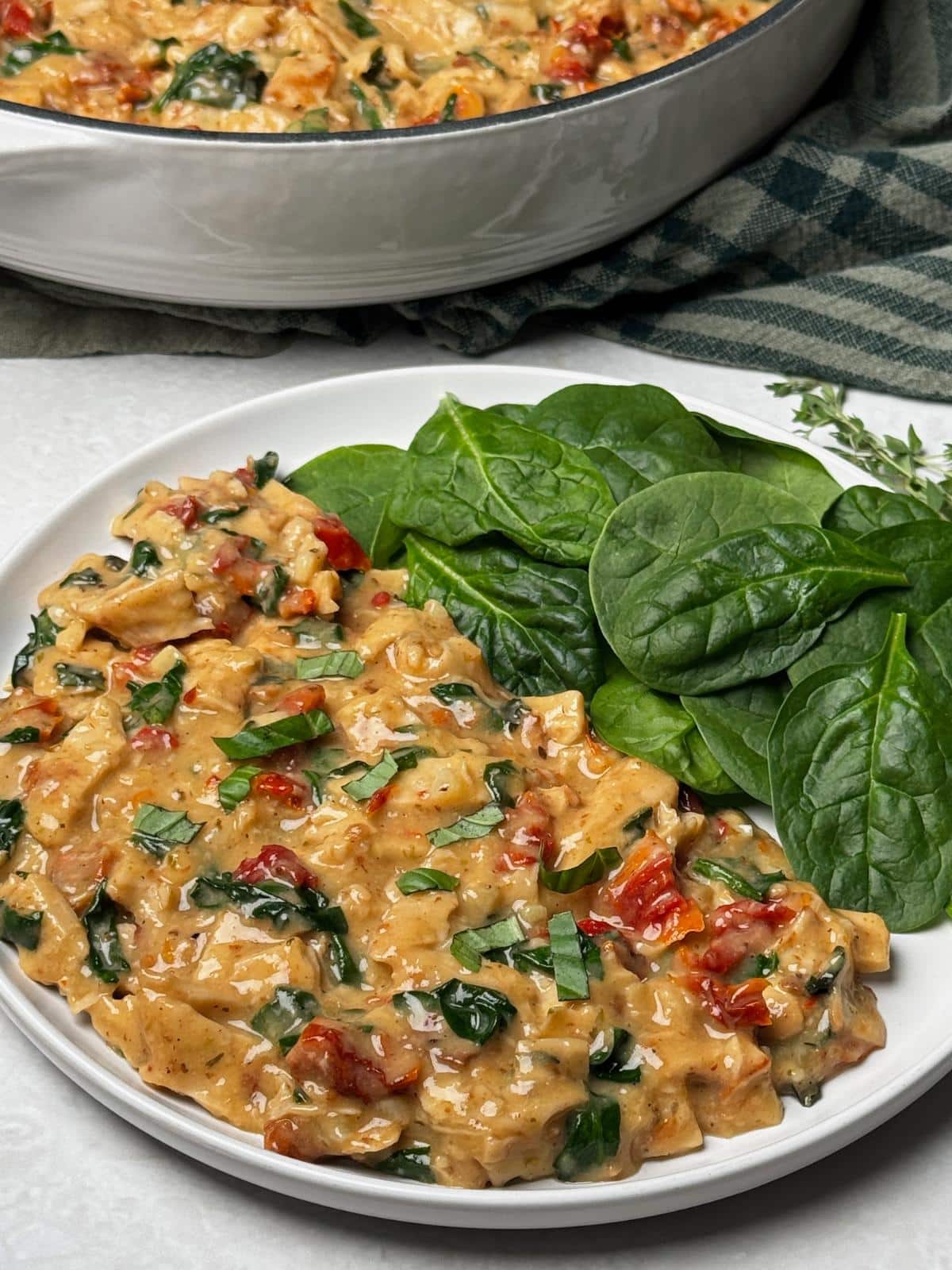 Plant based marry me chicken with fresh basil.