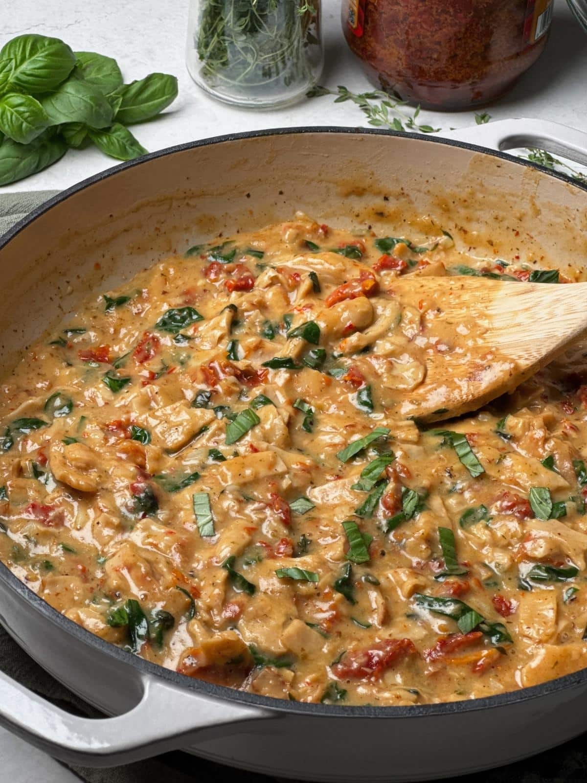 Stirring plant based marry me chicken.