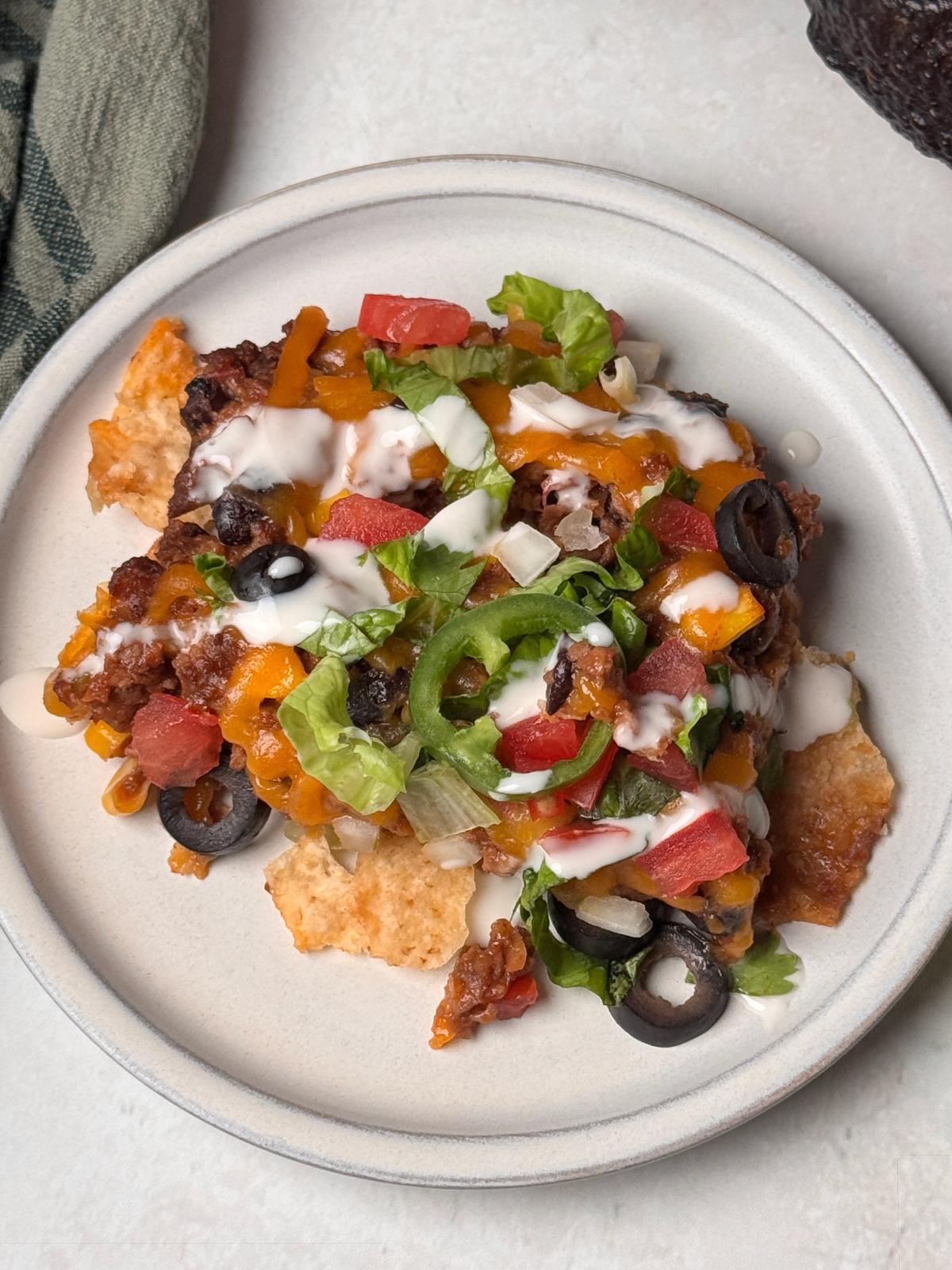 Taco casserole served onto a plate.