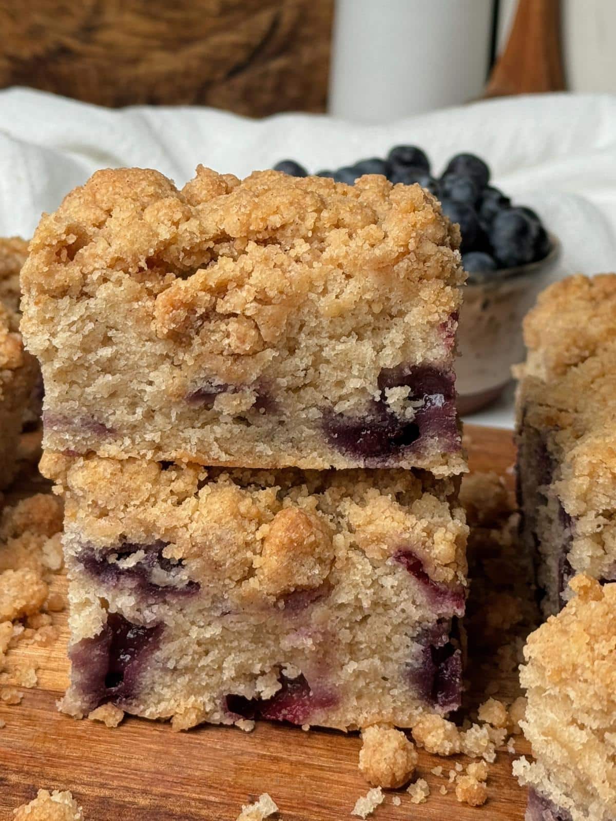 Two slices of blueberry coffee cake.