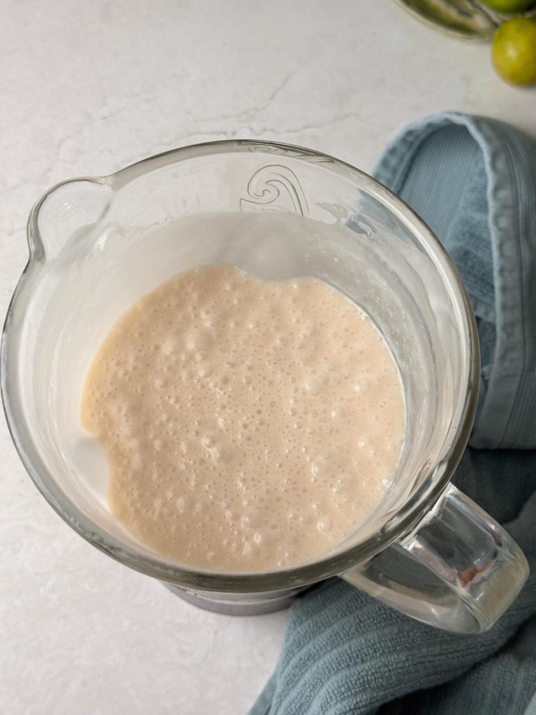 Key lime pie filling in a blender.