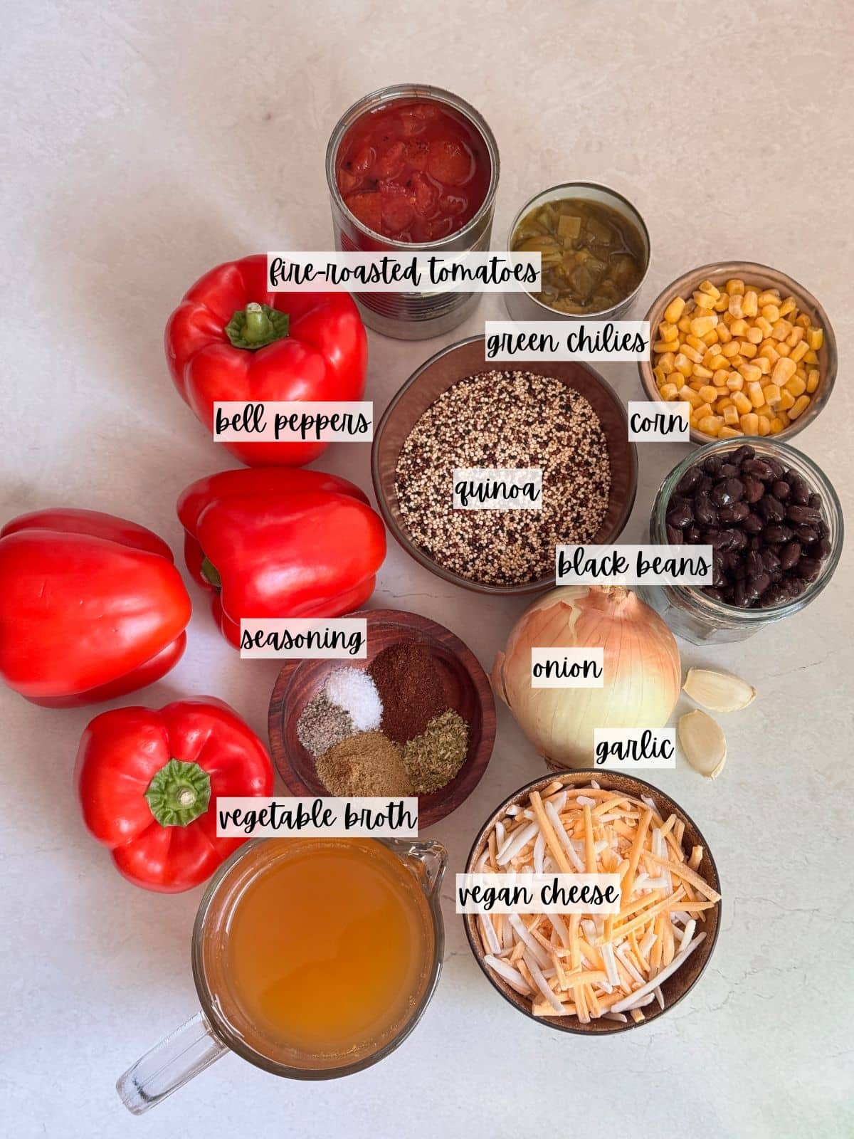 Labeled ingredients for quinoa stuffed peppers.