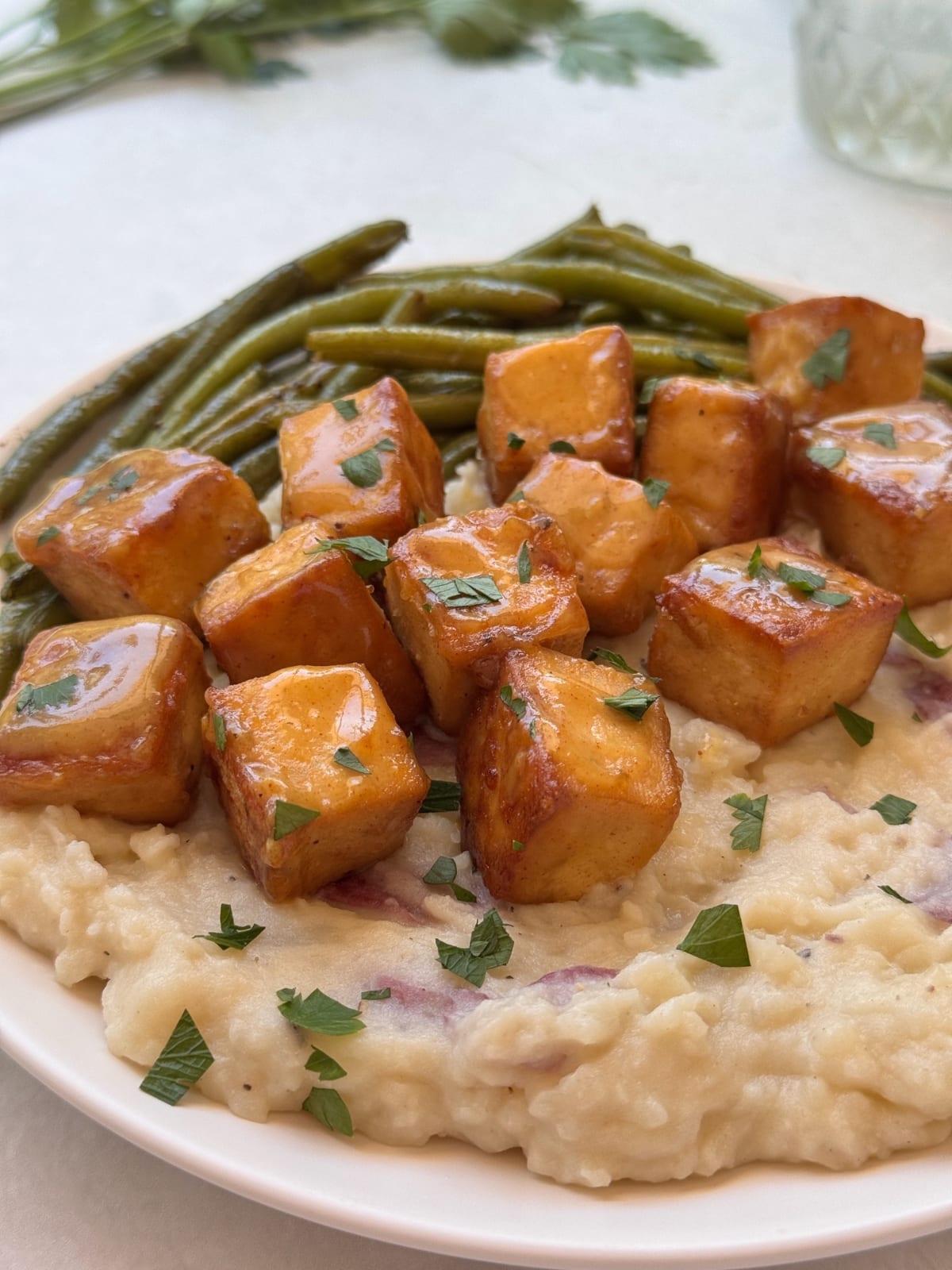 Crispy tofu with a vegan honey mustard sauce.